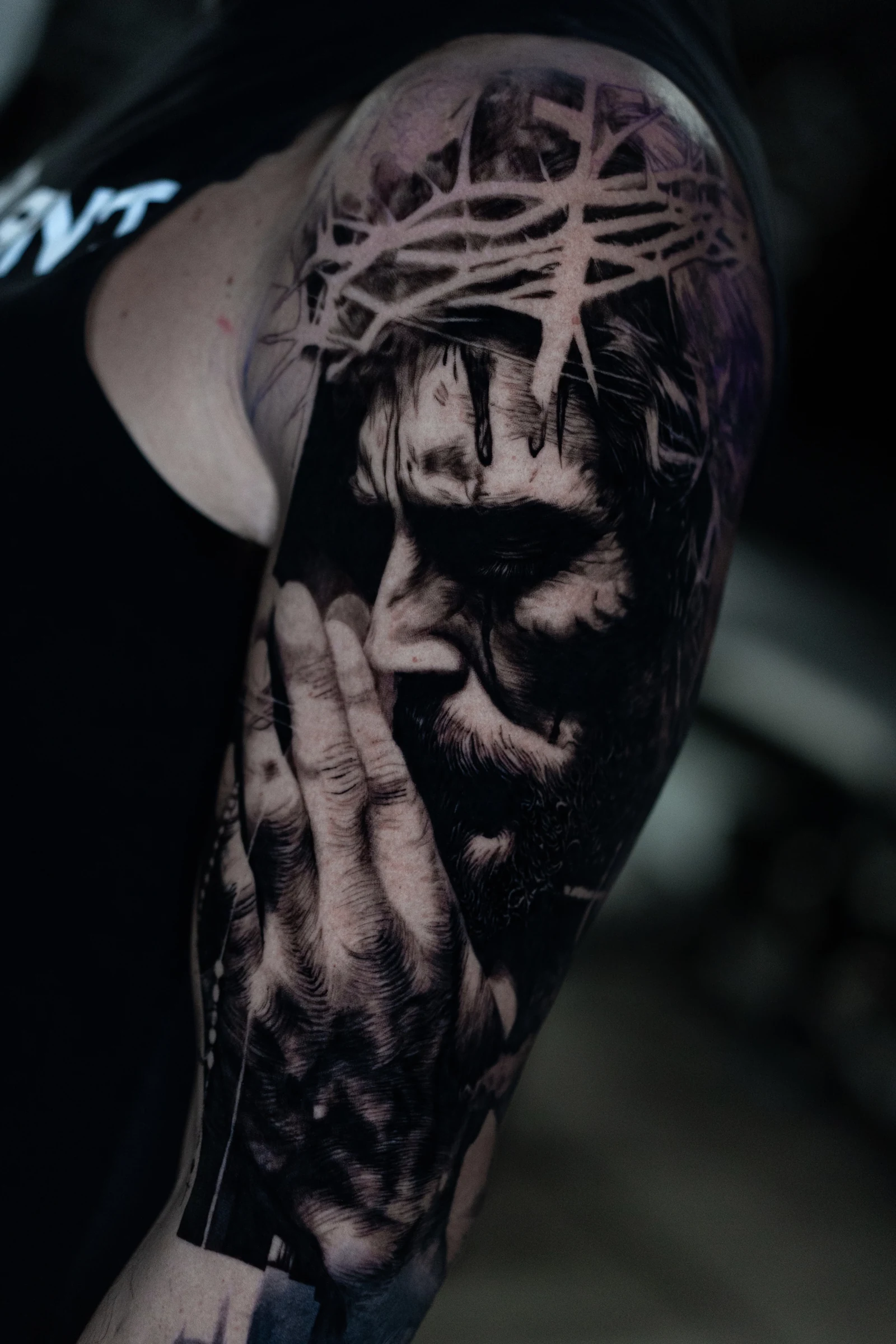 Black and grey realism tattoo portrait with hands and crown of thorns by Vladimir Vishar